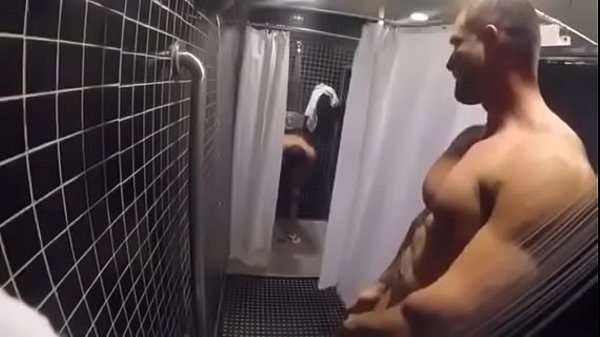 A young muscular gay man in the shower could not resist the bailiffs of his training buddy